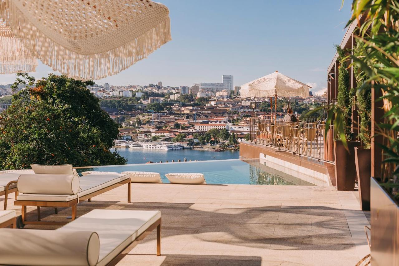Torel Avantgarde Porto Exterior foto The rooftop pool at the Four Seasons Hotel
