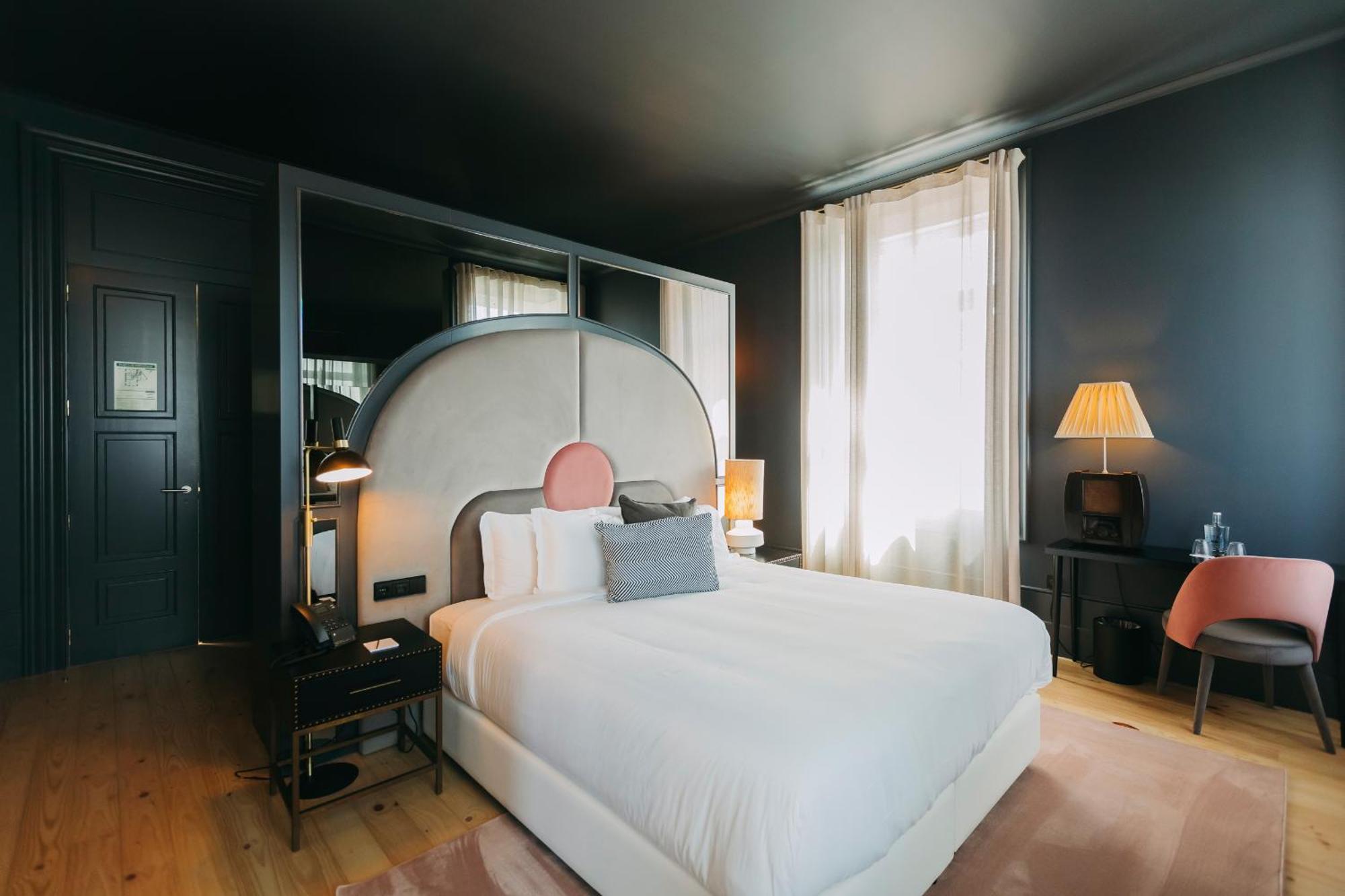 Torel Avantgarde Porto Zimmer foto A bedroom at the Hotel